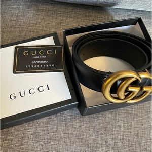 Classic Gucci GG black leather belt with gold hardware